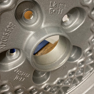 Centre of a Silver powder coated alloy wheel