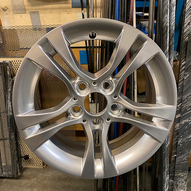Silver powder coated alloy wheel