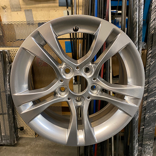 Silver powder coated alloy wheel