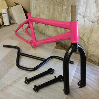 Pink and black powder coated bike frame