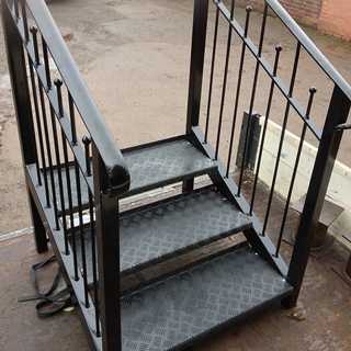 Black powder coated metal stairs
