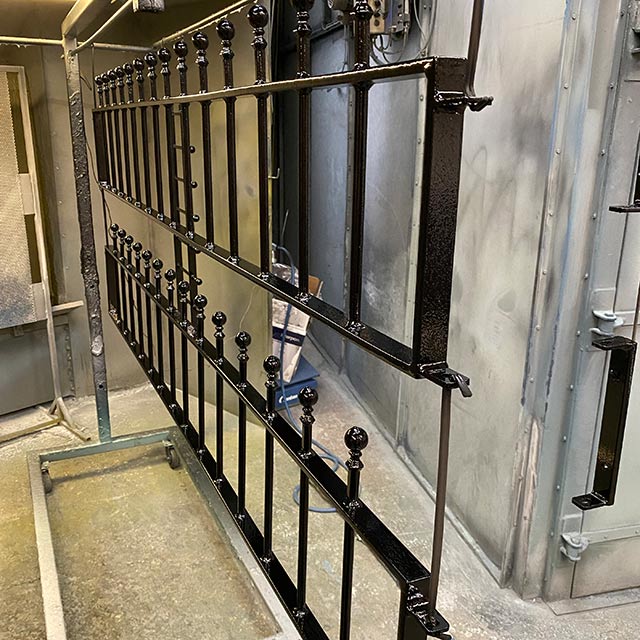 Newly black powder coated railings