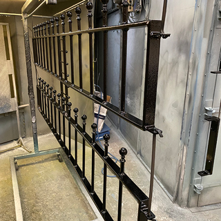 Newly black powder coated railings