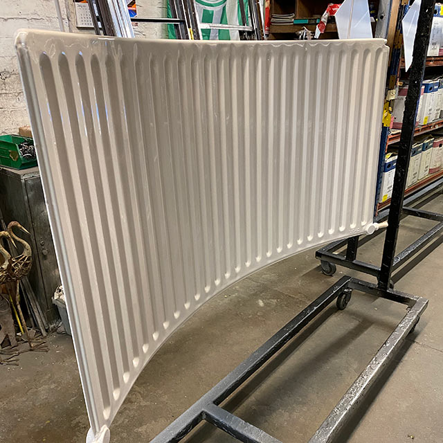 White powder coated curved radiator