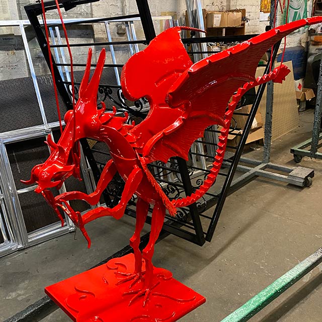Red powder coated dragon ornament