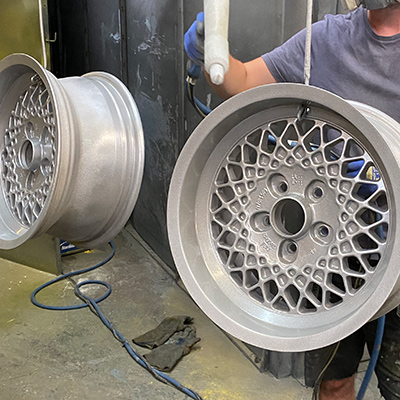 Wheel alloys being powder coated in Silver colour